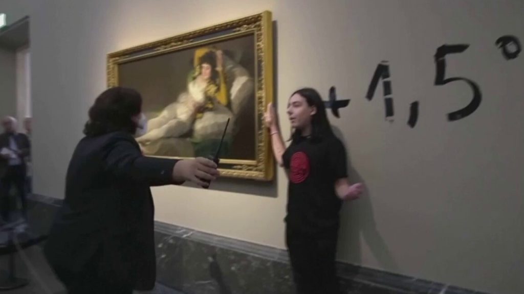 Climate protesters in Spain glue themselves to Goya paintings