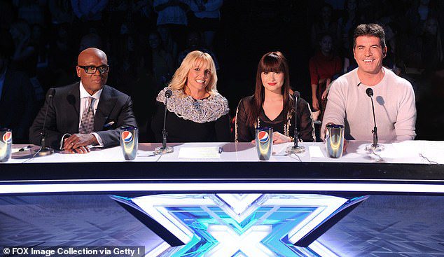 All-Stars: Britney (seconda a sinistra) è apparsa come giudice nella versione americana di The X Factor nel 2012 con i giudici (L-R) LA Reid, Demi Lovato e Simon